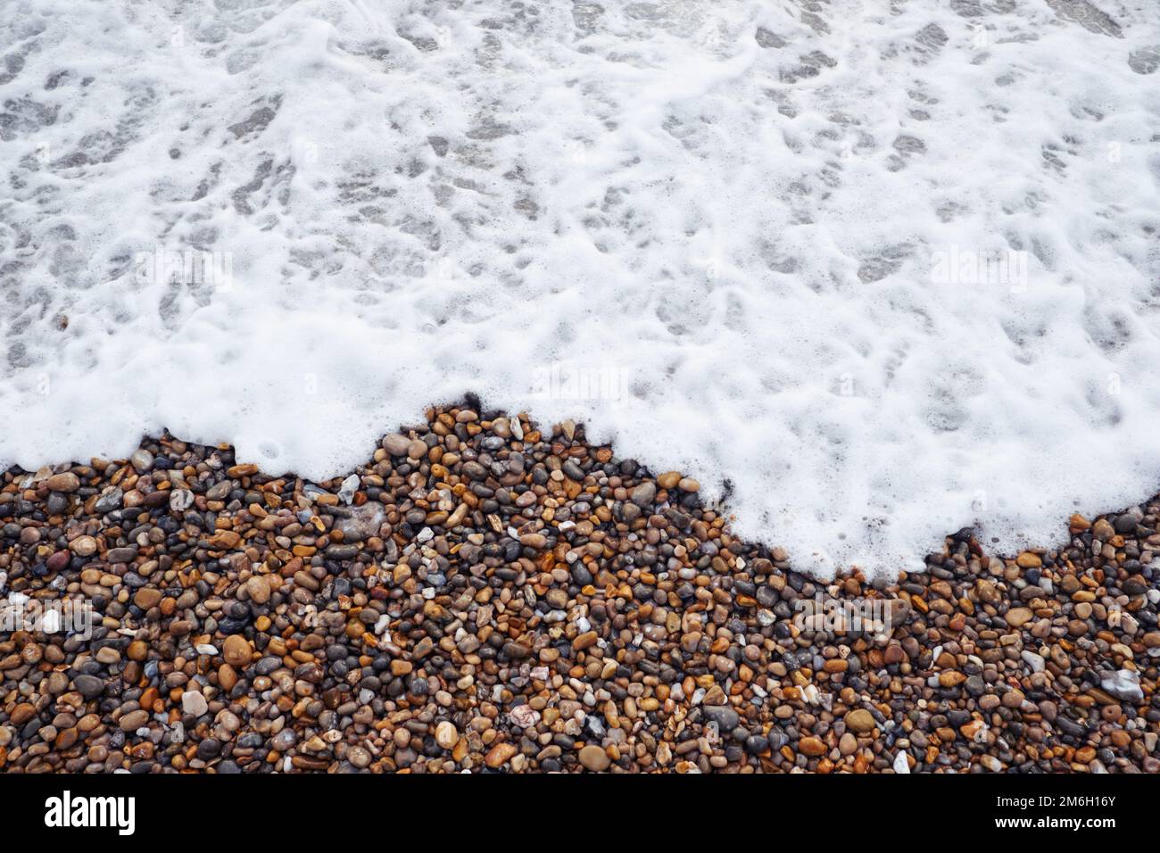 Foamy sea surf washes over hi-res stock photography and images - Alamy