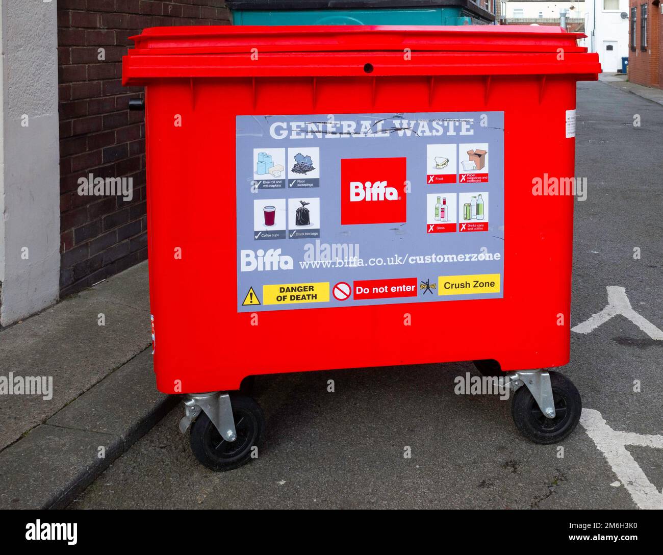 A heavy weight commercial waste container for shops in Redcar High Street Cleveland Stock Photo