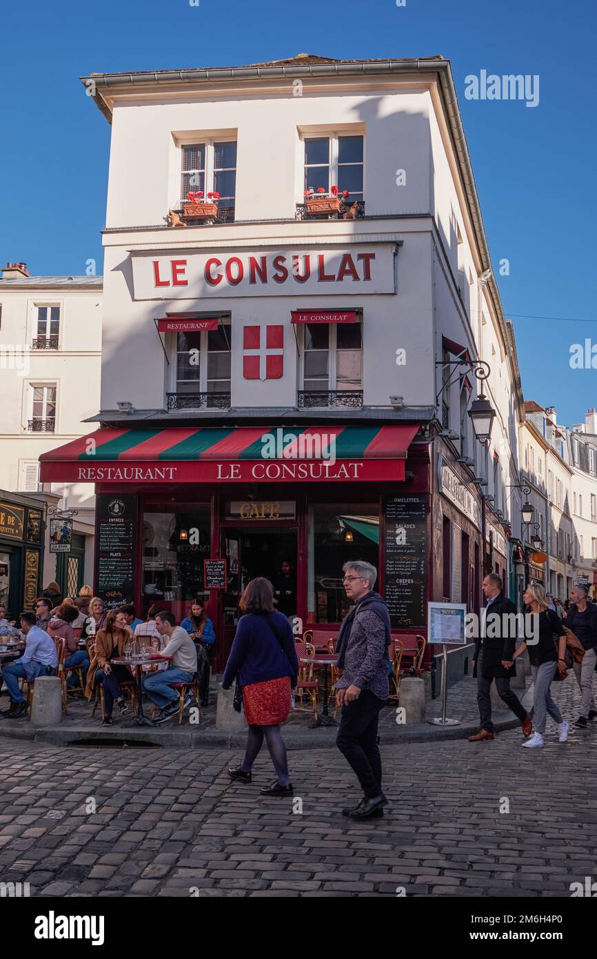 View of typical paris cafe in Montmartre area, a popular destination in Paris, France - Le Consulat is a traditional cafe Stock Photo