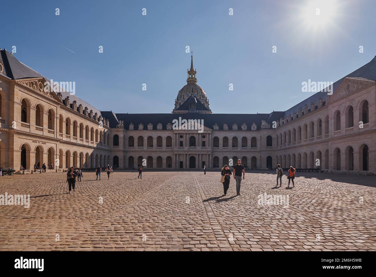 Court of honor in Les Invalides in Paris, or National Residence of the Invalids courtyard. Complex of museums and monuments rela Stock Photo