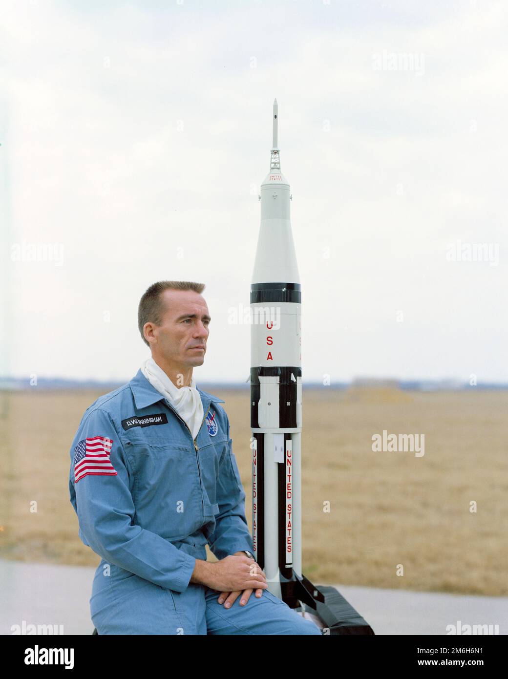Cape Canaveral, United States. 04 January, 2023. NASA astronaut Walter Cunningham, lunar module pilot for the Apollo 7 mission poses with a model of the Apollo 7 Saturn rocket ship at the Kennedy Space Center, February 13, 1968 in Cape Canaveral, Florida. Cunningham died January 4, 2023 at 90-years-old, the last surviving member of the NASA Apollo 7 mission. Stock Photo