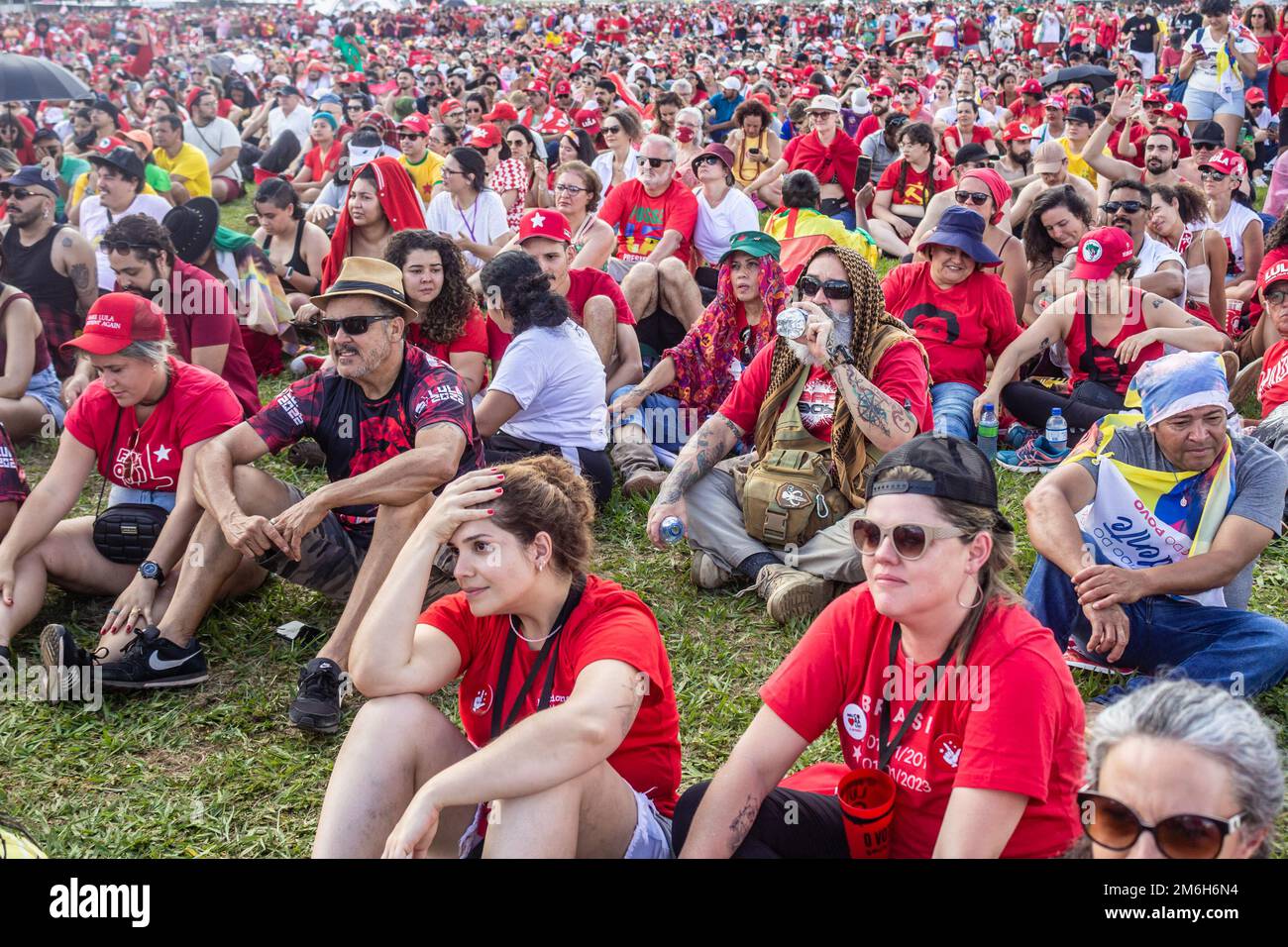 Brasília, DF, Brazil – January 01, 2023: The crowd listening to the speech at the inauguration event of the president-elect of Brazil, Lula. Stock Photo