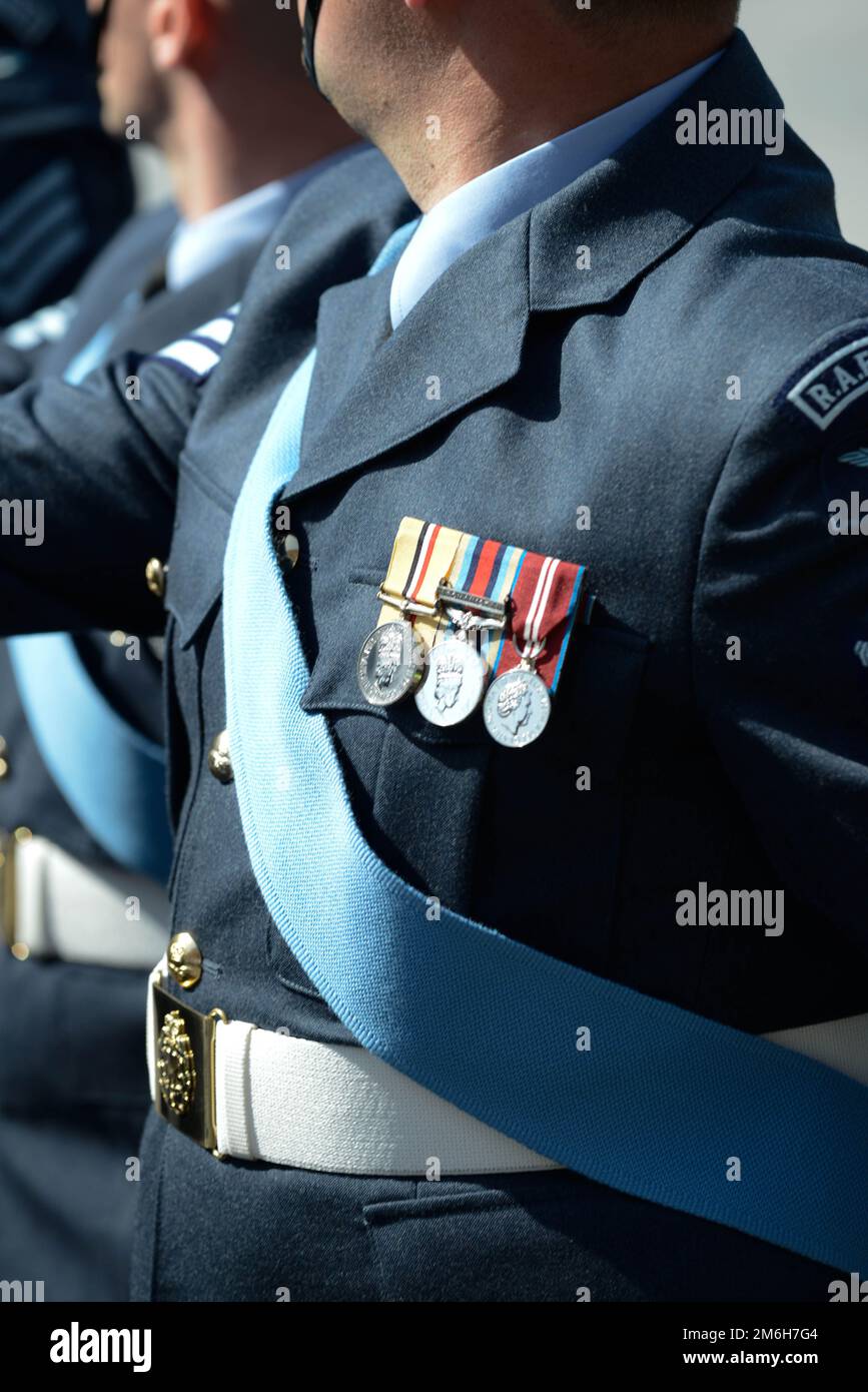 Uniform detail as an RAF Regiment Gunner marches on parade Stock Photo