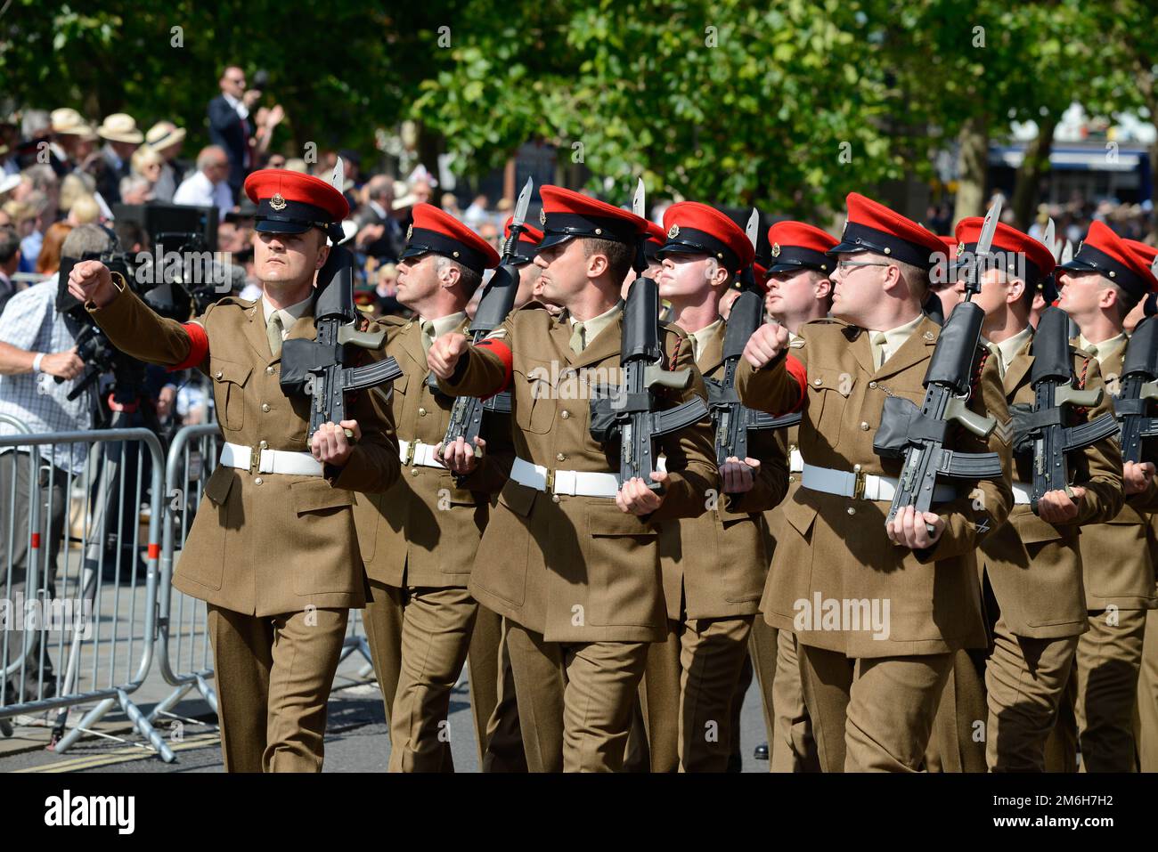 British army soldiers of the Royal Military Police; a Red Cap, march on parade Stock Photo