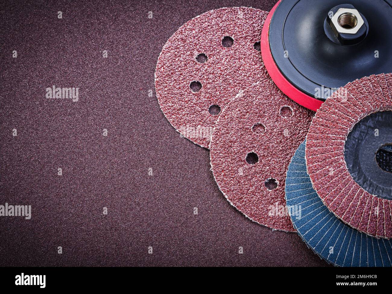 Sanding discs holder on polishing sheet abrasive materials Stock Photo