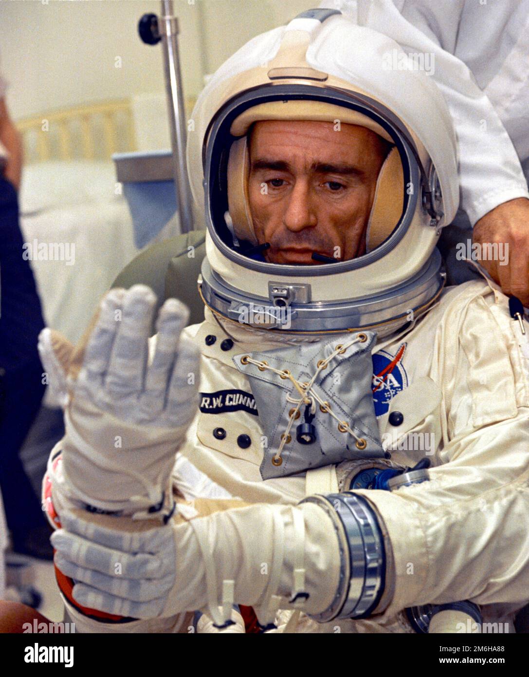 Houston, United States. 29 December, 1966. Houston, United States. 29 December, 1966. NASA astronaut Walter Cunningham, lunar module pilot for the Apollo 7 mission, suits up for Altitude Chamber Test at the Johnson Space Center, December 29, 1966 in Houston, Texas. Cunningham died January 4, 2023 at 90-years-old, the last surviving member of the NASA Apollo 7 mission. Stock Photo