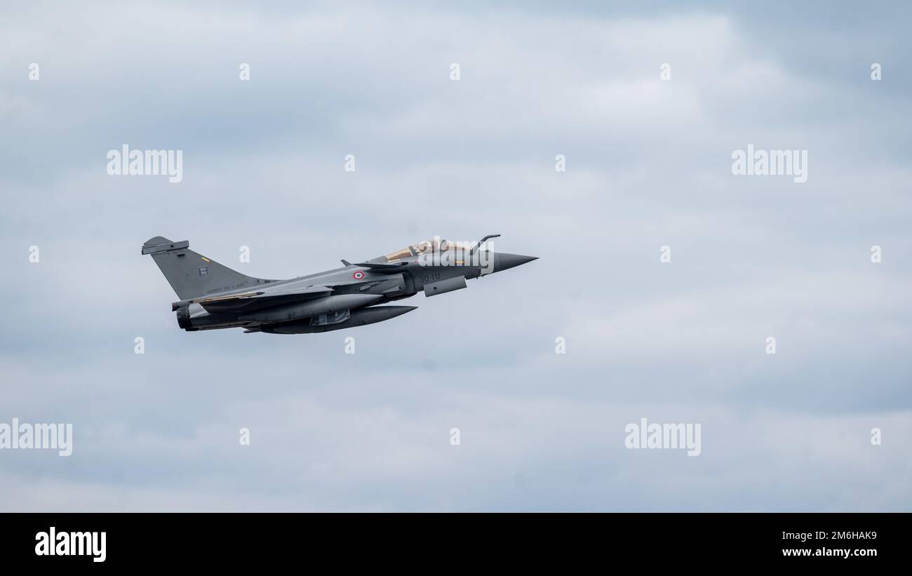 A French Air Force Dassault Rafales takes-off from the flight line ...