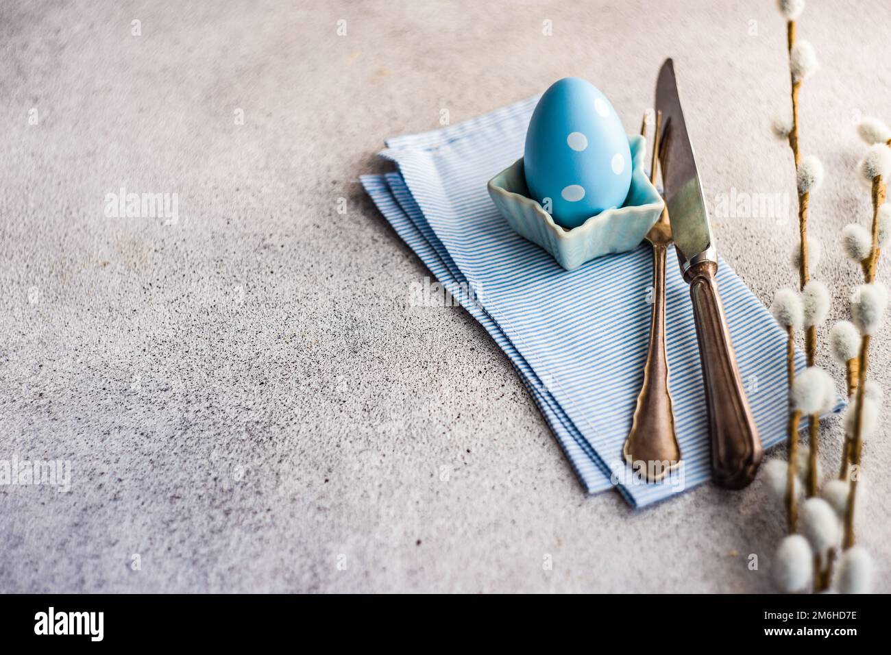 Festive Easter place setting decorated with eggs Stock Photo
