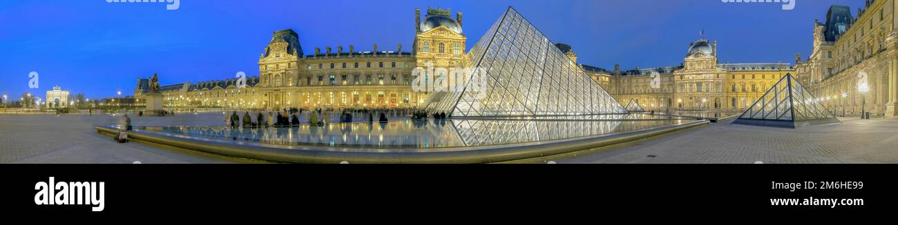 Louvre illuminated Panorama Paris France Stock Photo