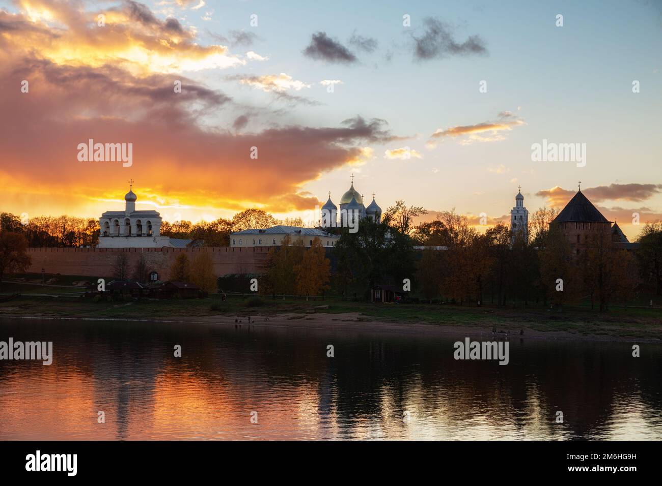Evening in Veliky Novgorod. Novgorod Kremlin against the backdrop of the sunset sky Stock Photo