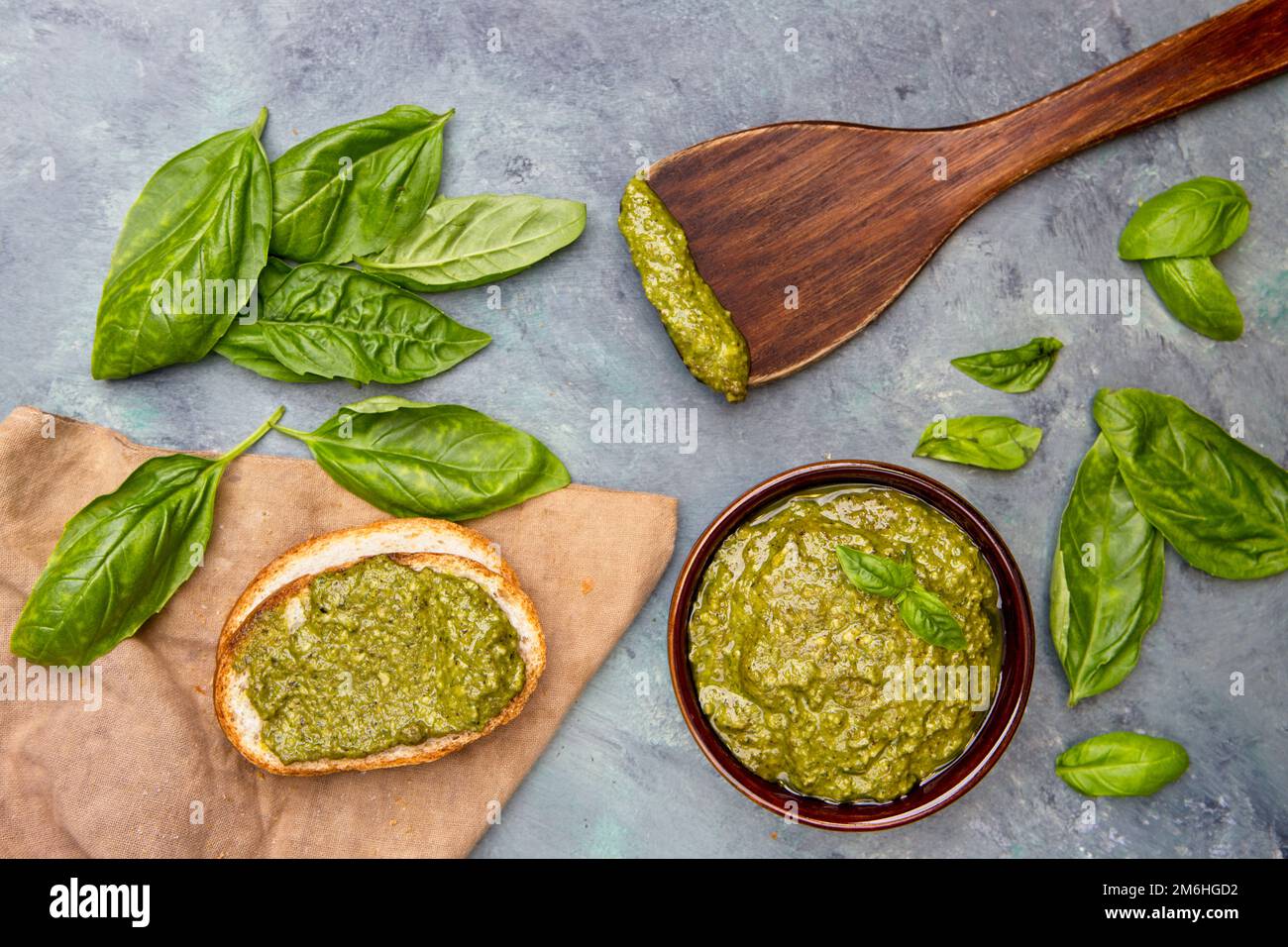 Pesto and basil themed flatlay. Stock Photo