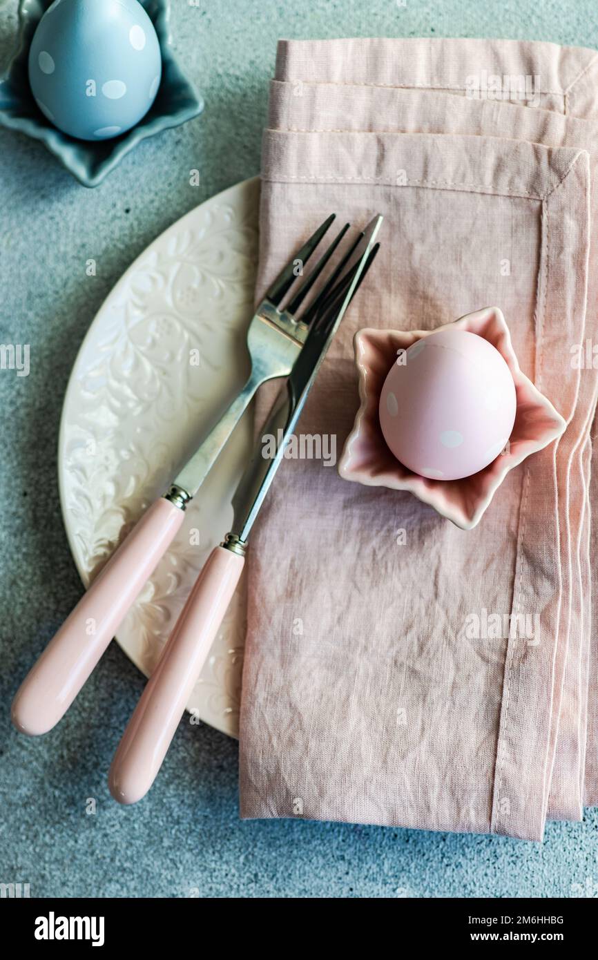 Festive Easter place setting decorated with eggs Stock Photo