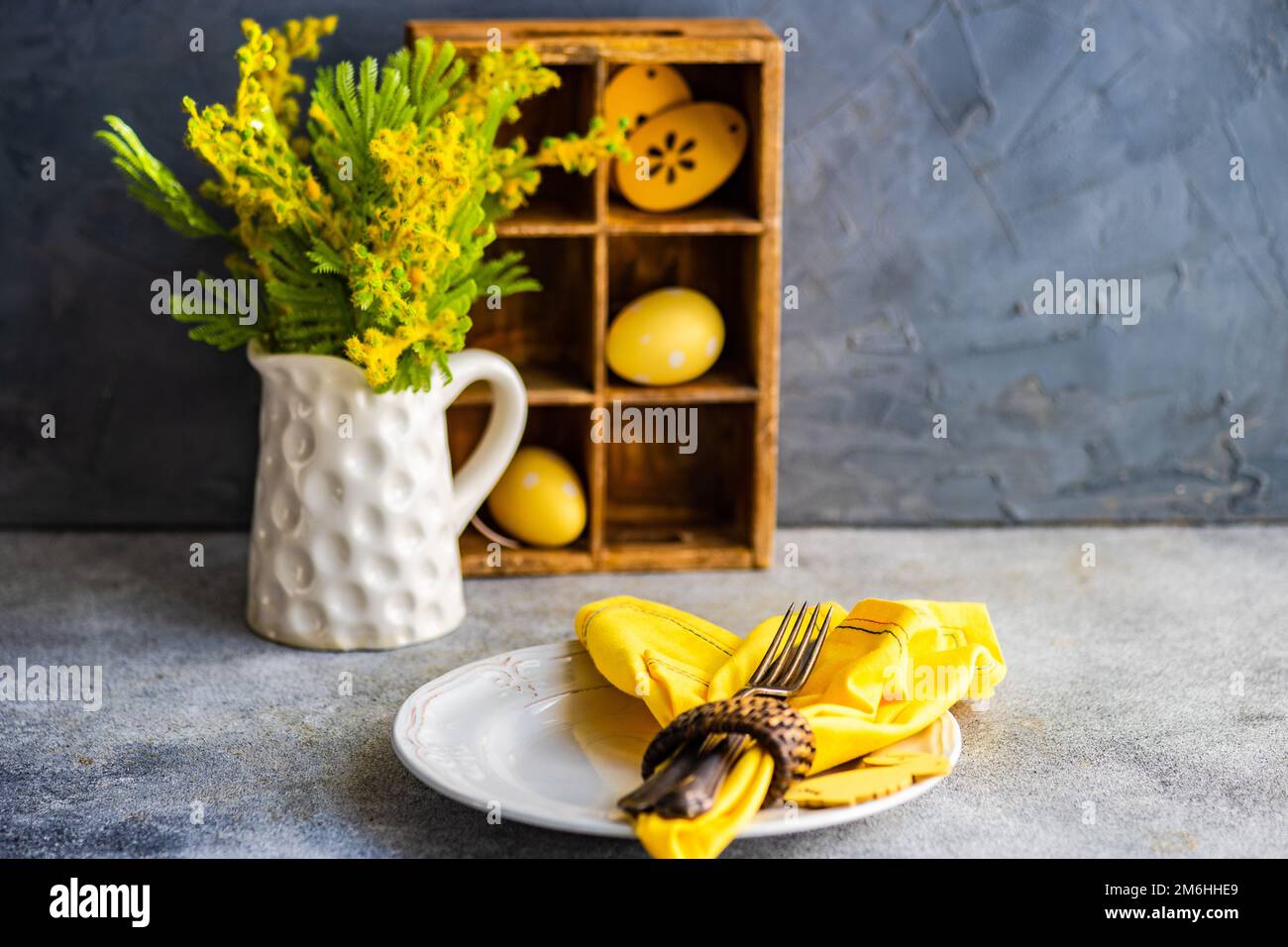 Easter table setting on concrete background Stock Photo