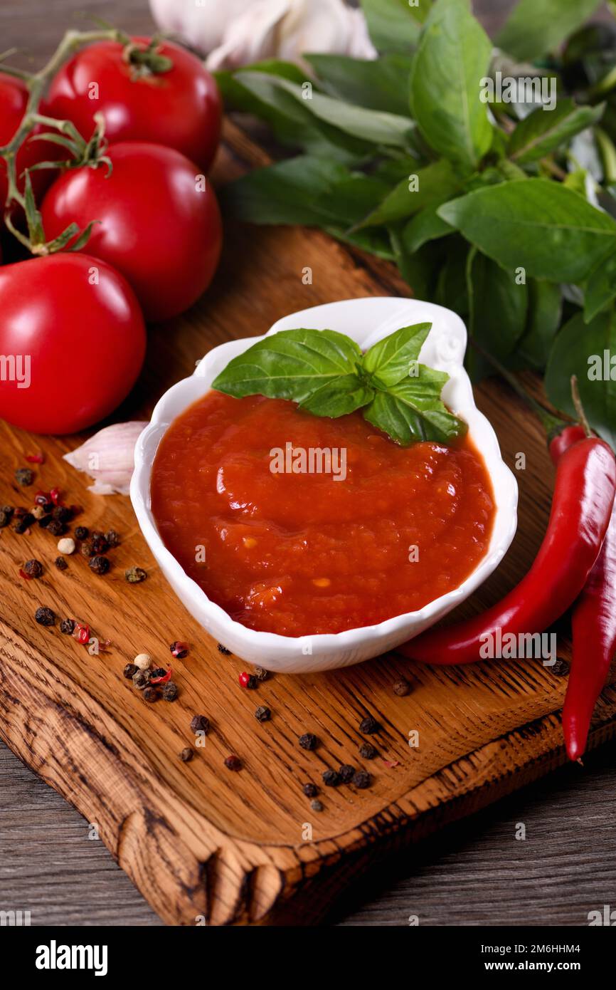 Traditional classic homemade tomato sauce with spices and herbs