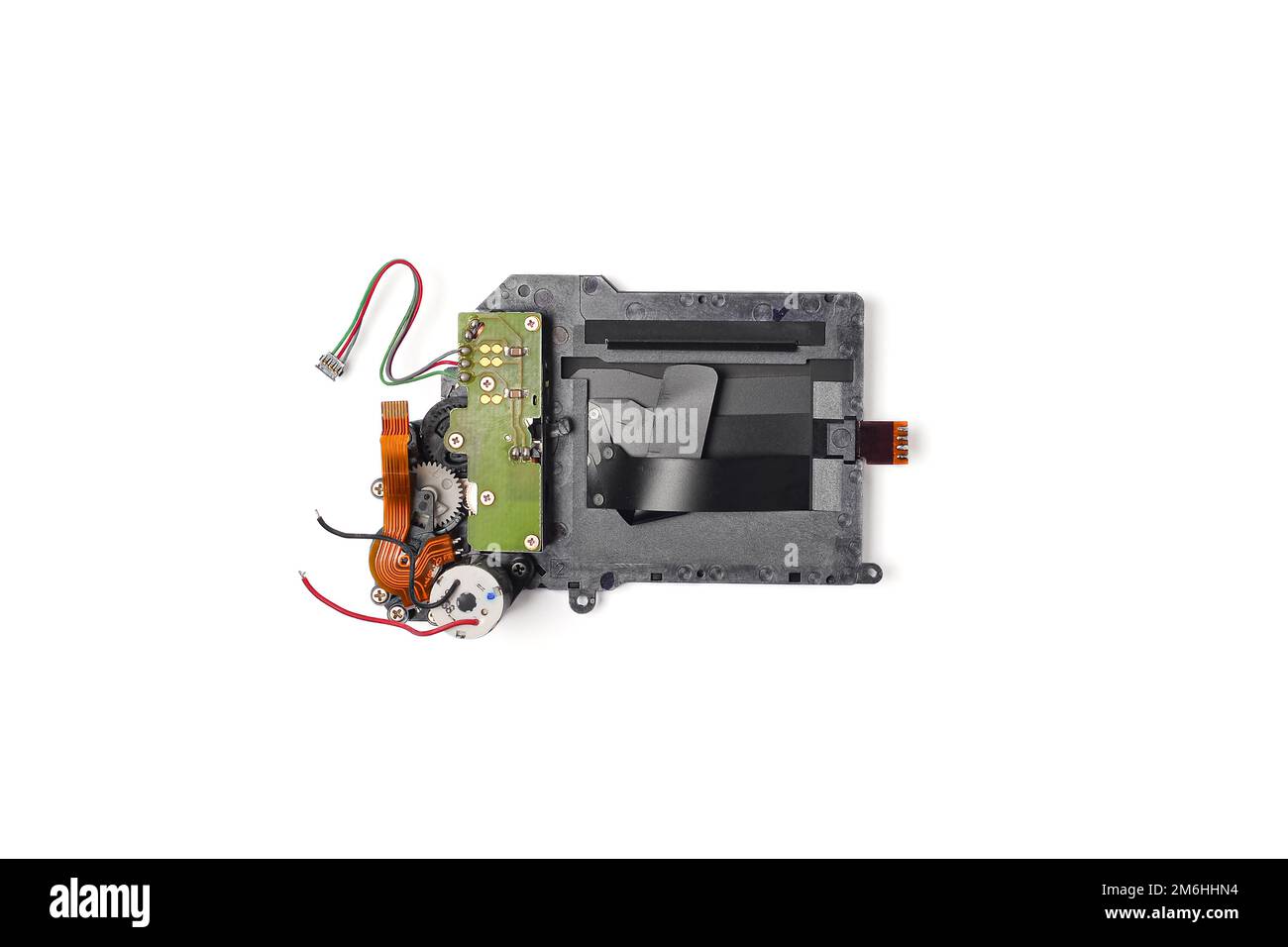 Old broken shutter of digital camera isolated on a white background