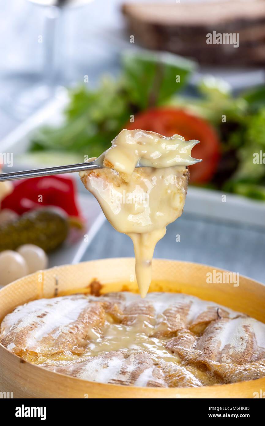 Swiss cheese fondue with bread Stock Photo Alamy
