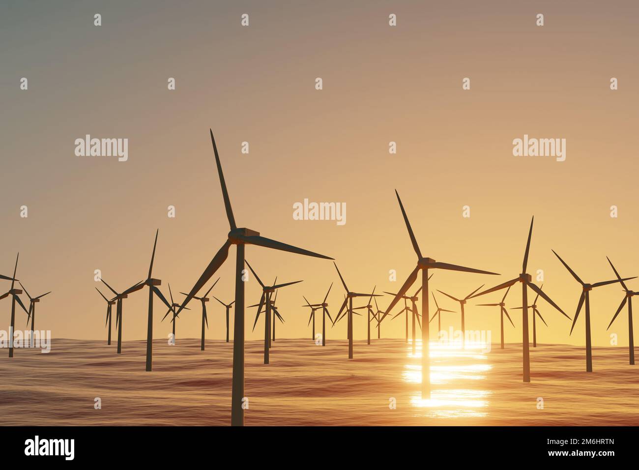 Array of wind turbines in a wind farm on the ocean at sunset ...