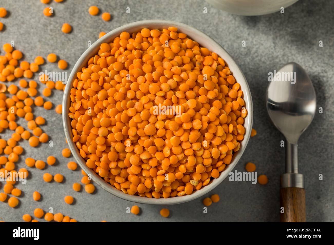 Raw Organic Red Lentils Legume in a Bowl Stock Photo