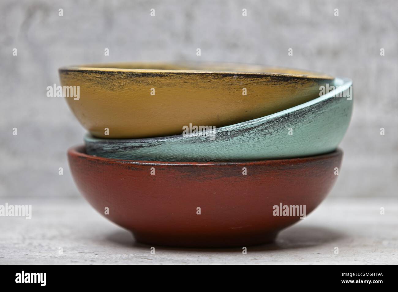 Thick glass mugs stacked. Drinking water storage containers. Light  background Stock Photo - Alamy