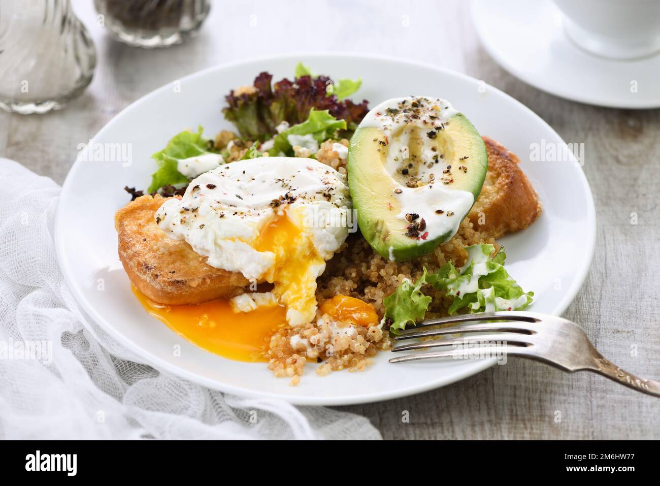A healthy and balanced breakfast plate. Benedict's egg spreads on a