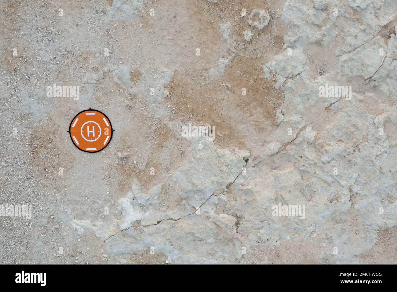 Orange drone land pad for safe landing. Safety aerial fly target Stock Photo Alamy