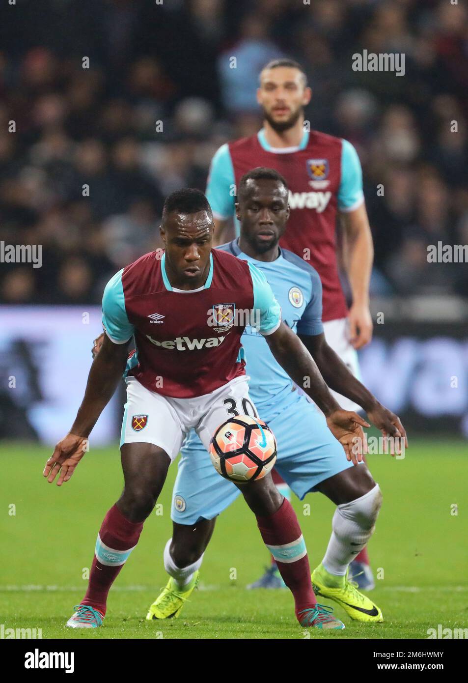 Michail Antonio of West Ham United shields the ball from Bacary Sagna of Manchester City - West Ham United v Manchester City, FA Cup Third round, The London Stadium, London - 6th January 2017. Stock Photo