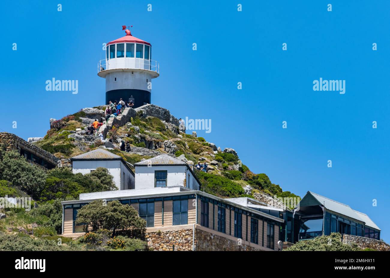 Visitors climbing up to the Lighthouse at the Cape Point. Table Mountain National Park, Western Cape, South Africa. Stock Photo
