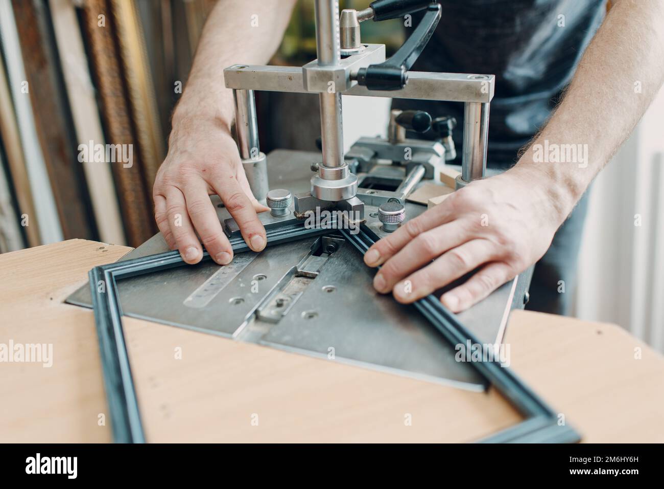 Framing Workshop. Making baguette handmade picture frame at studio Stock Photo