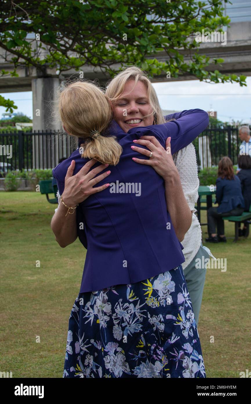 Amy Rule hugs Alexandria Eaglin as they part ways at the U.S Consulate General Naha, Japan, April 28, 2022. Rule rejoined her husband, Ambassador Rahm Emanuel, at the U.S. Consolate General Naha as they both finished their visit to Okinawa . Stock Photo