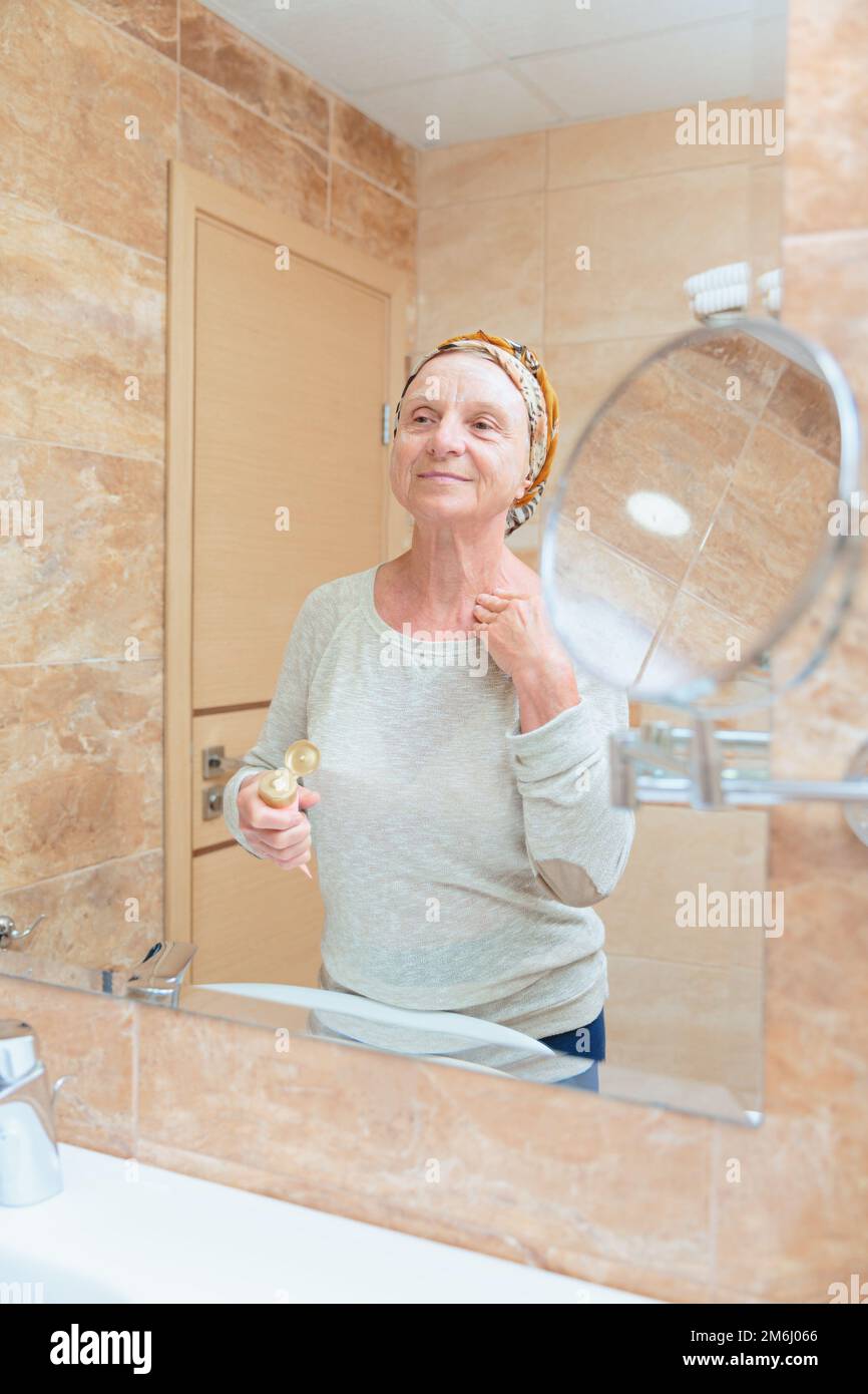 Woman face mask taking hi-res stock photography and images - Alamy