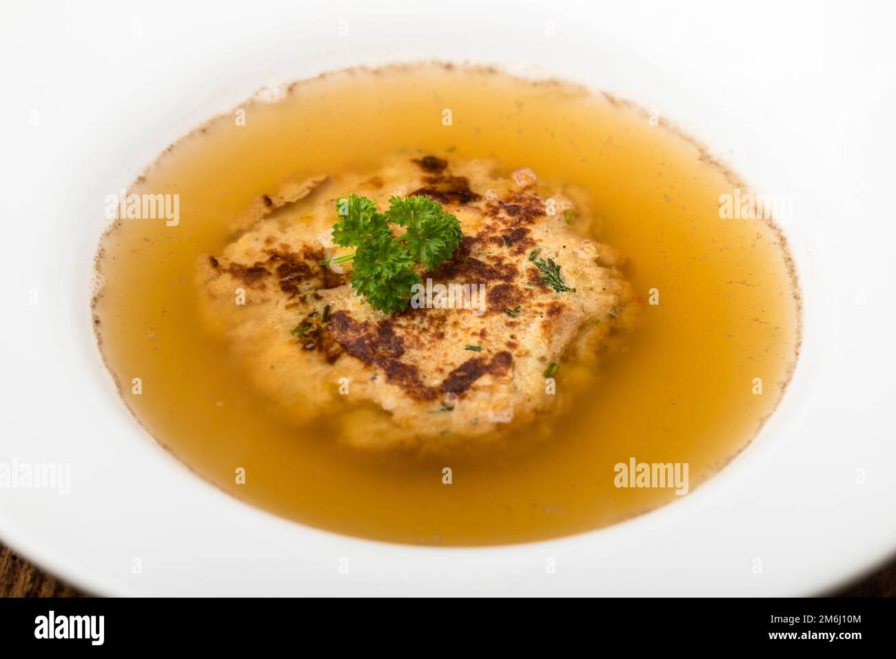 Austrian cheese dumpling in broth Stock Photo