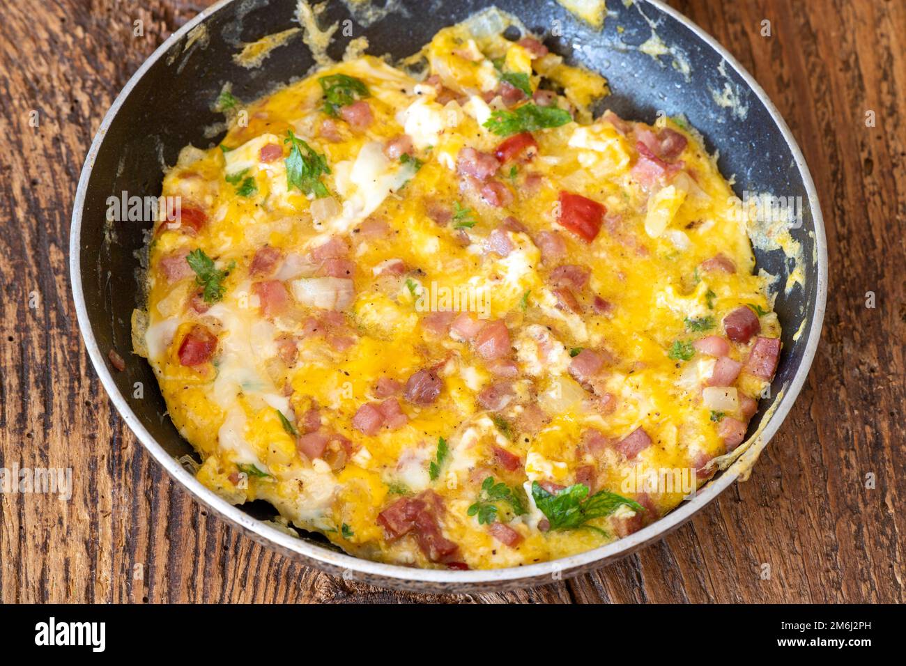 Fry scrambled eggs in pan hi-res stock photography and images - Alamy