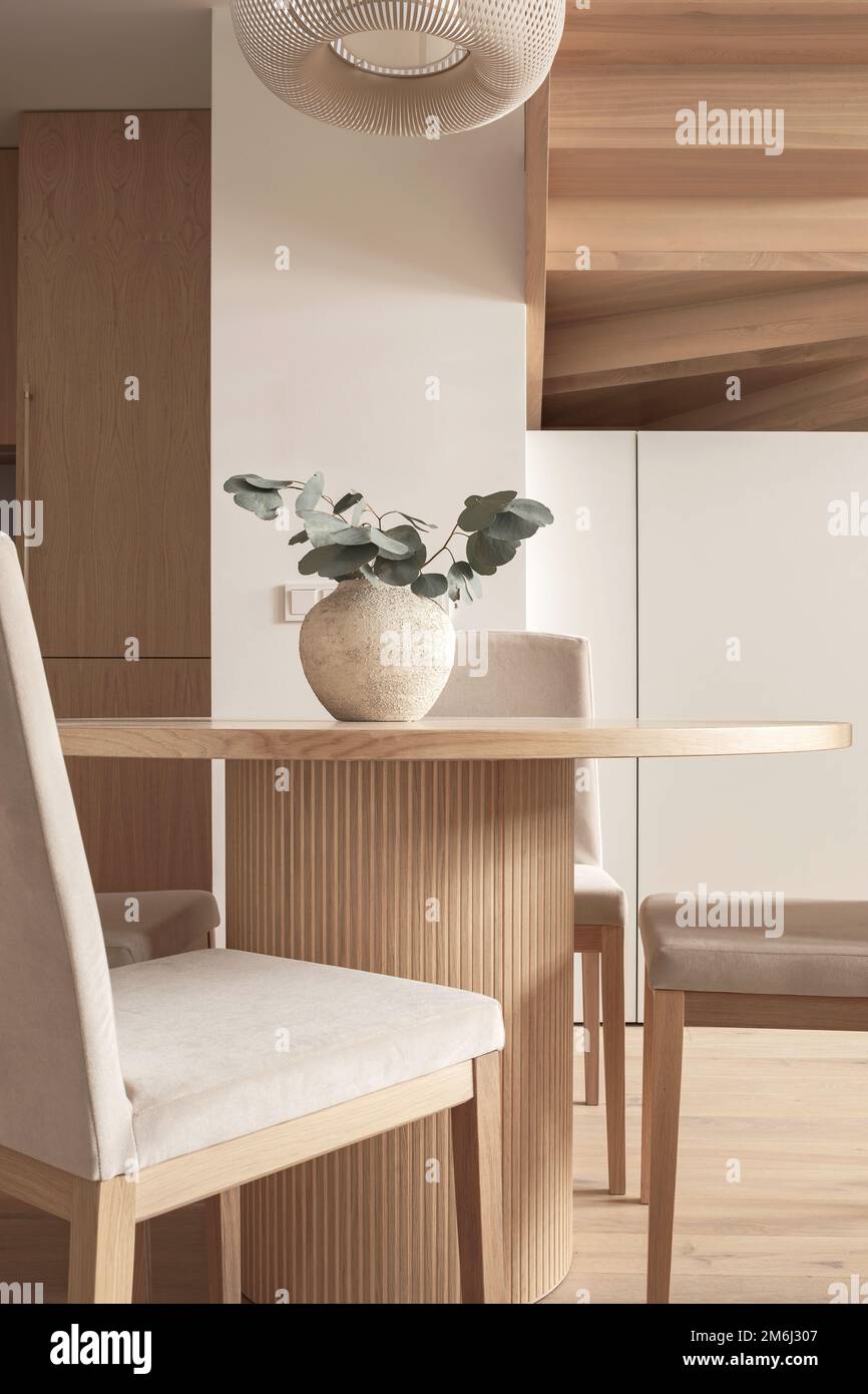 A cozy Home interior in warm beige tones in Japanese  and Scandinavian Style. Modern Scandinavian Dining Room Interior Design. Japandi Concept Stock Photo