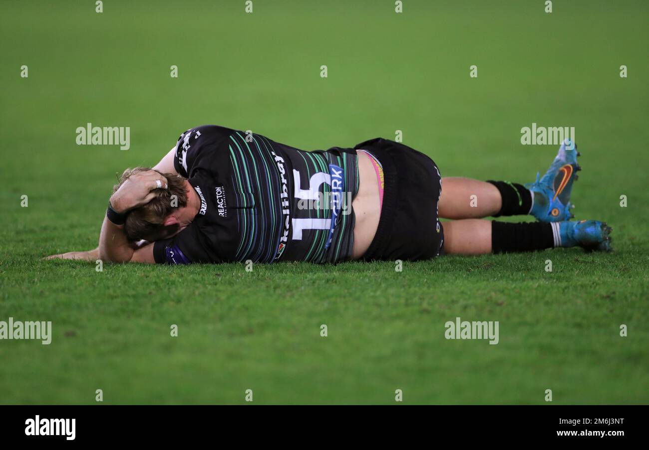 London Irish's Logan Trotter looks in pain after picking up an injury