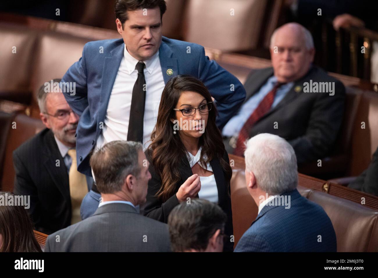 Washington, United States Of America. 04th Jan, 2023. United States Representative Matt Gaetz (Republican of Florida), top left, looks on as United States Representative Lauren Boebert (Republican of Colorado), center, speaks with other Representatives following the U.S. House of Representatives fourth vote for Speaker of the House, Wednesday, January 4, 2023. Credit: Cliff Owen/CNP/Sipa USA Credit: Sipa USA/Alamy Live News Stock Photo