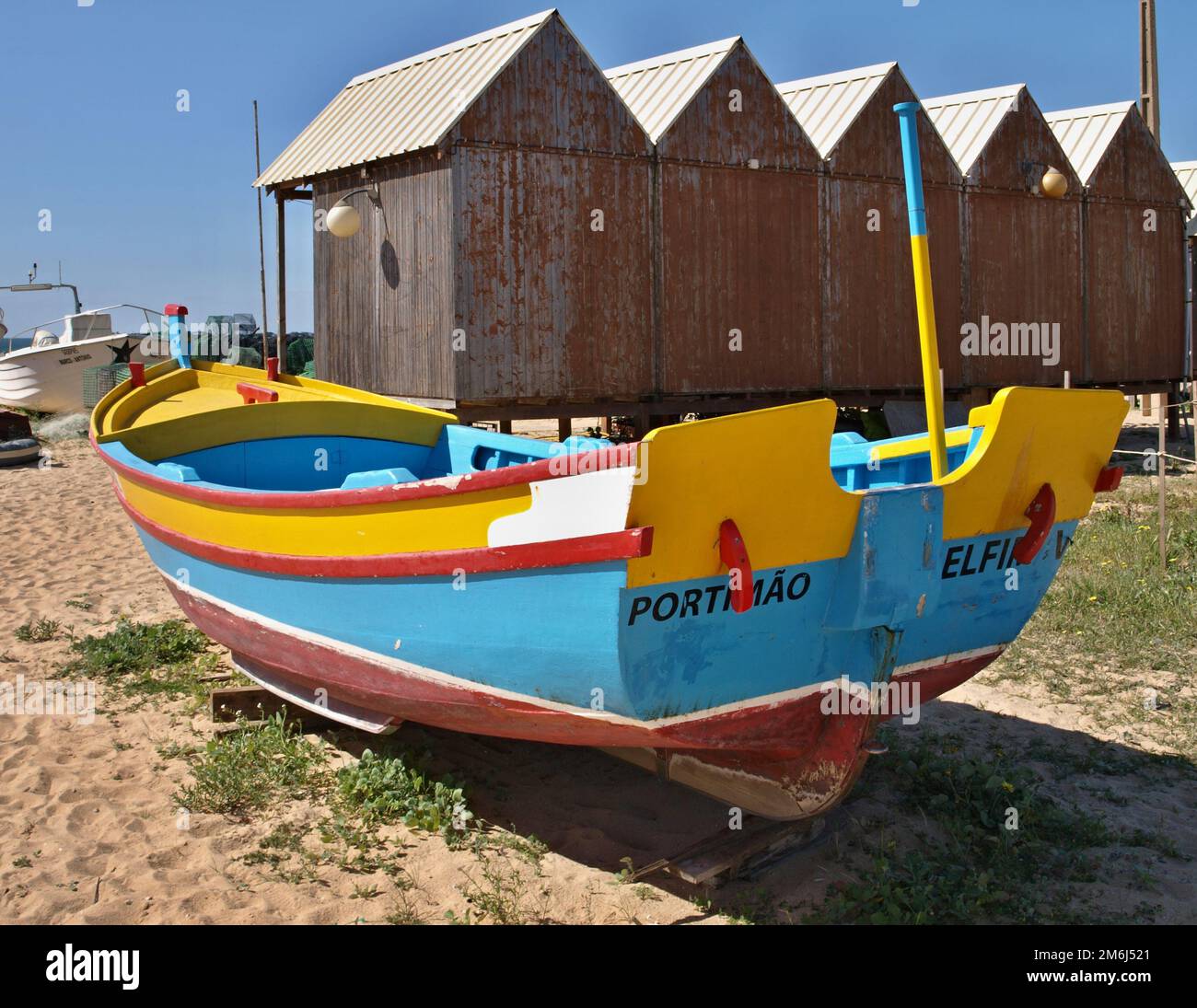 Traditional fishing boat on Armacao de Pera beach, Algarve - Portugal Stock Photo
