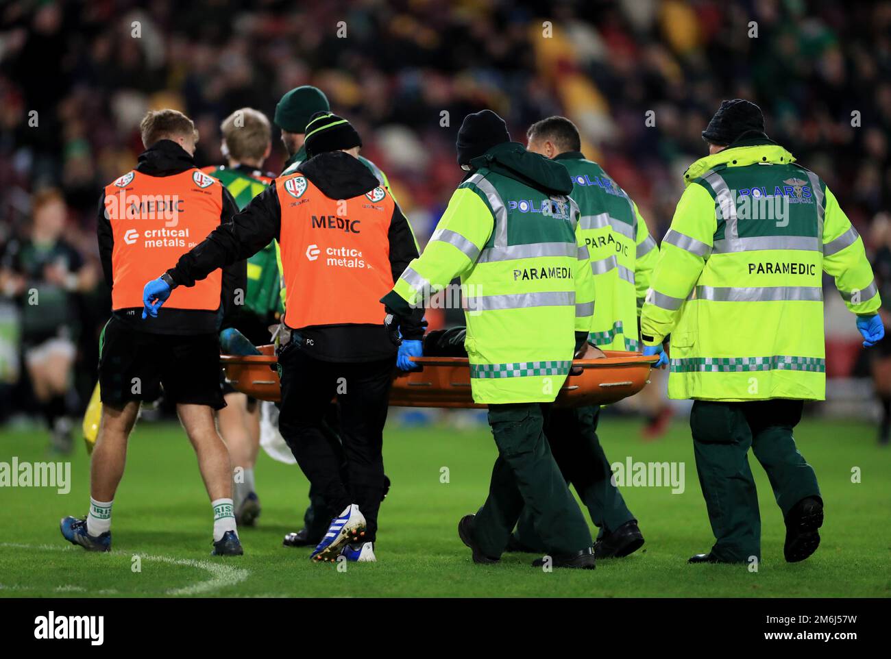 London Irish's Logan Trotter leaves on a stretcher after picking up an