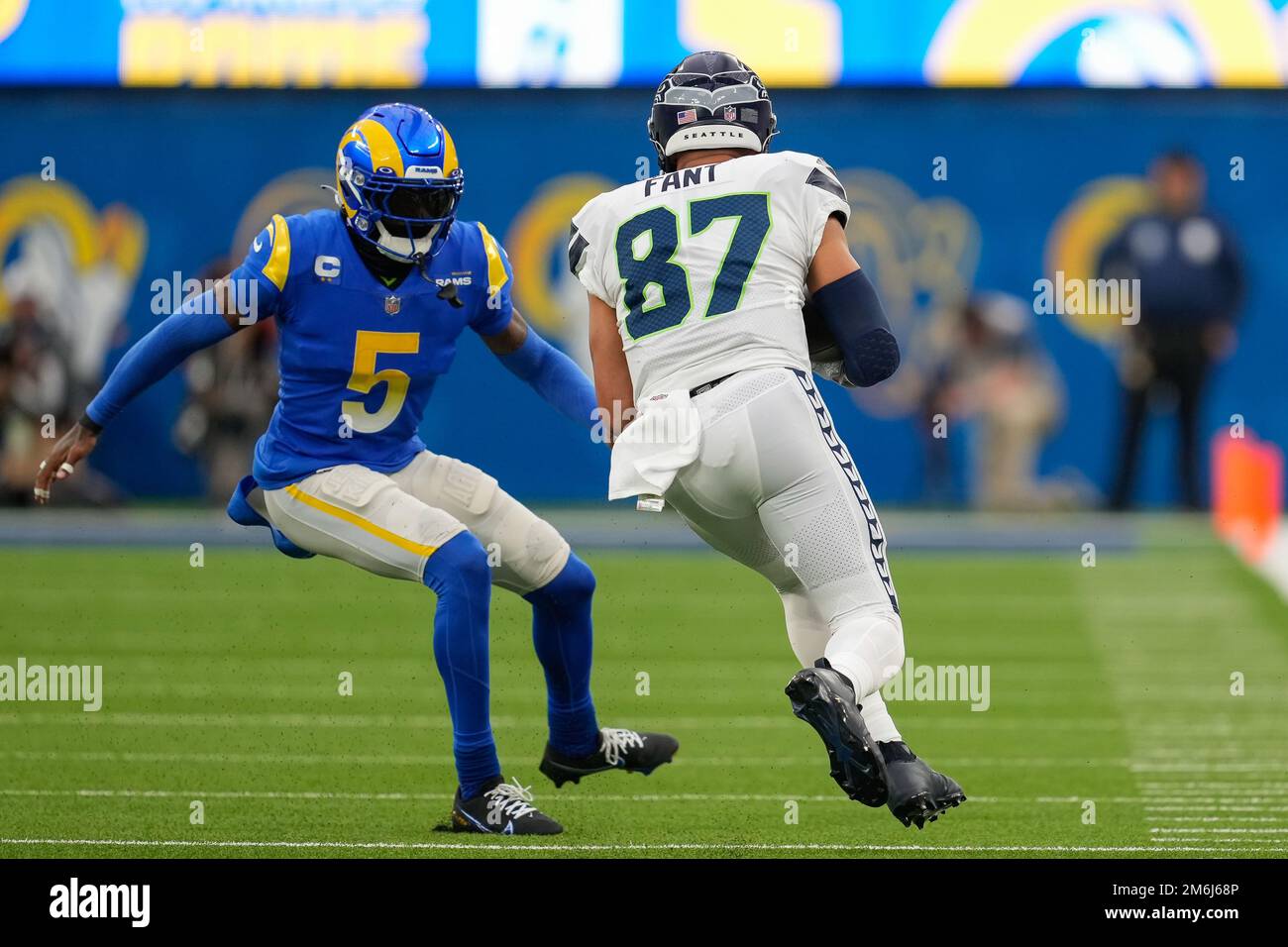 Seattle Seahawks tight end Colby Parkinson (84) catches a pass and gets tackled by Los Angeles Rams cornerback Jalen Ramsey (5) during a NFL football Stock Photo
