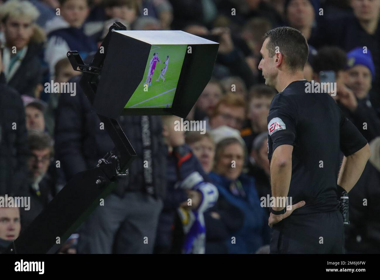 Referee David Coote Goes Over To The VAR Screen During The Premier ...