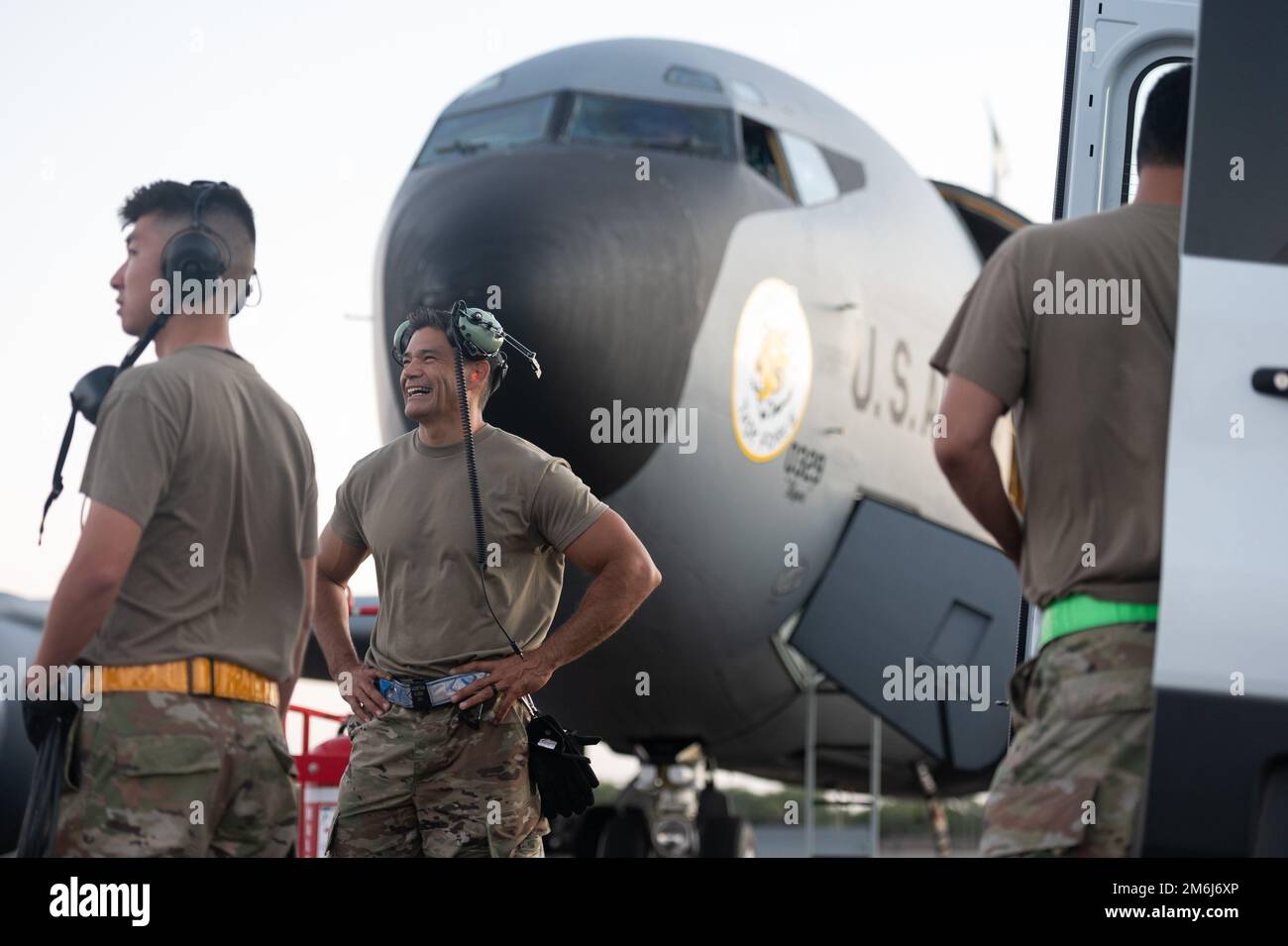 Senior Master Sgt. Paul Foster (center), 154th Aircraft Maintenance