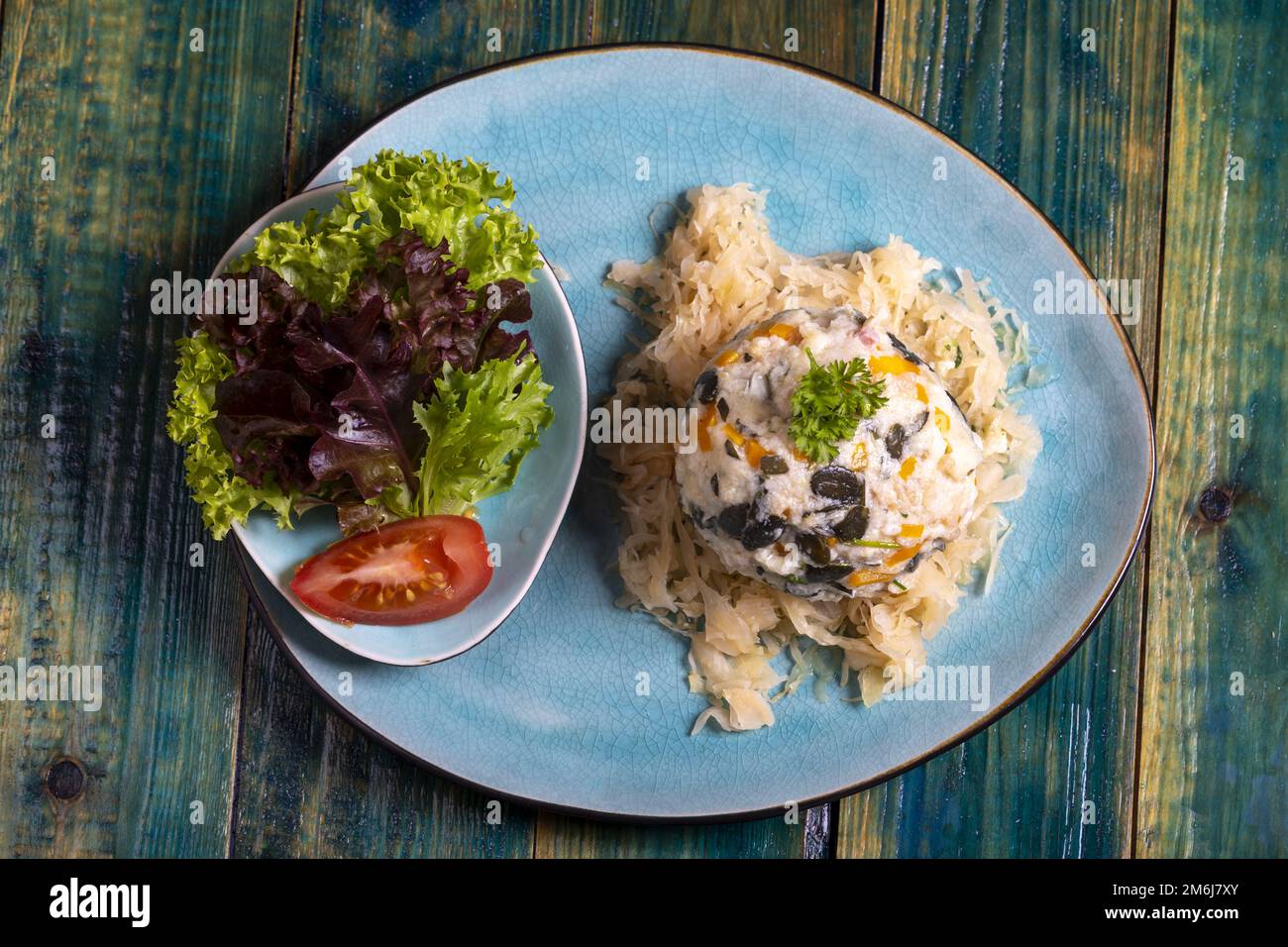 Austrian bread dumpling on sauerkraut Stock Photo