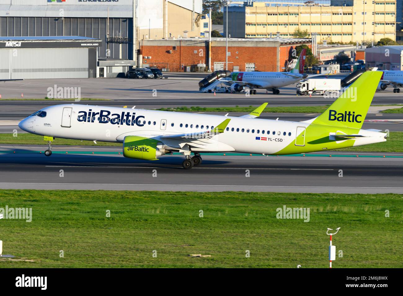 AirBaltic Airbus A220 airplane taking off from Lisbon. Aircraft formerly know as Bombardier CSeries 300 of Air Baltic taking off to Riga, Lativa. Stock Photo