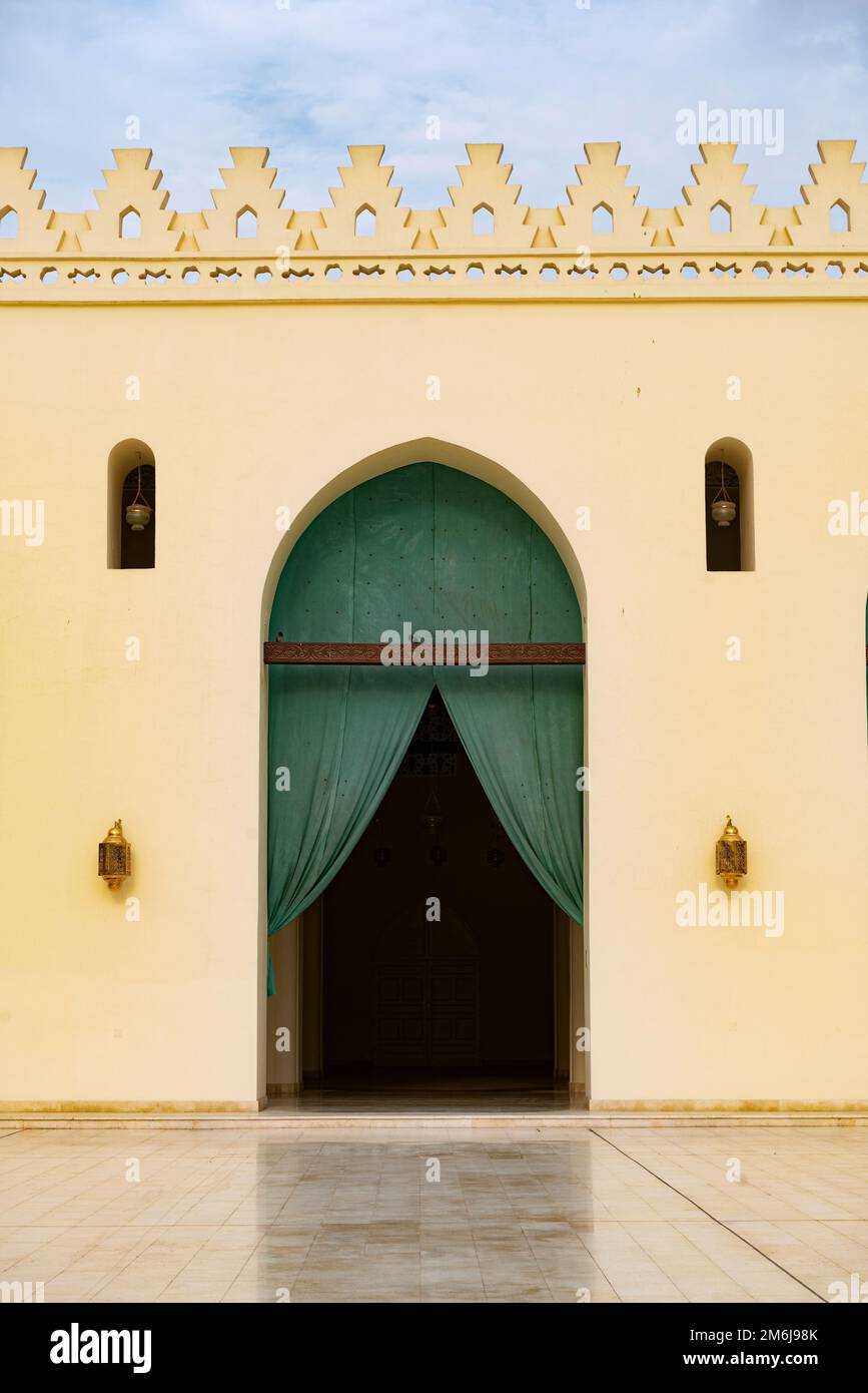 Arched doorway to the prayer hall of historic Mosque of al-Hakim, also known as Al-Anwar, named after Al-Hakim bi-Amr Allah. Just inside the Fatimid g Stock Photo