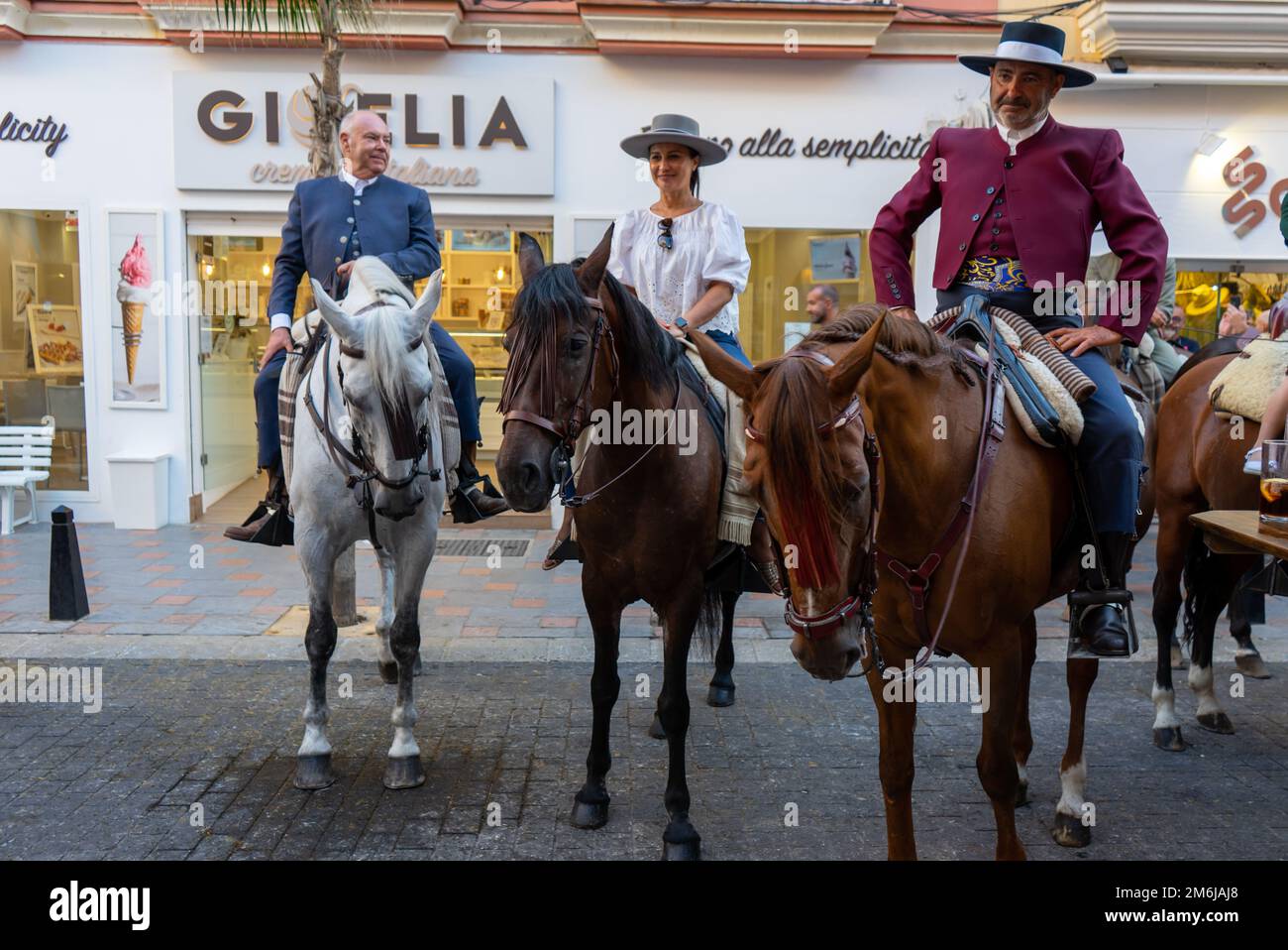 Spanish Riders Crewel FUENGIROLLA, SPAIN - SEPTEMBER 17, 2022: Spanish traditional riders ...