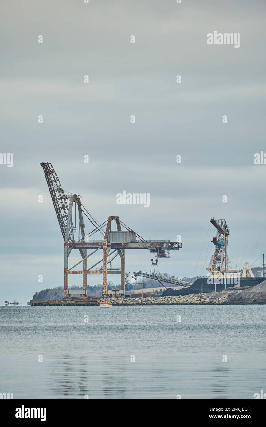 The sydney International Coal Pier is in Sydney Nova Scotia Canada. It is owned by Nova Scotia Power and is used to receive and store coal and petroli Stock Photo