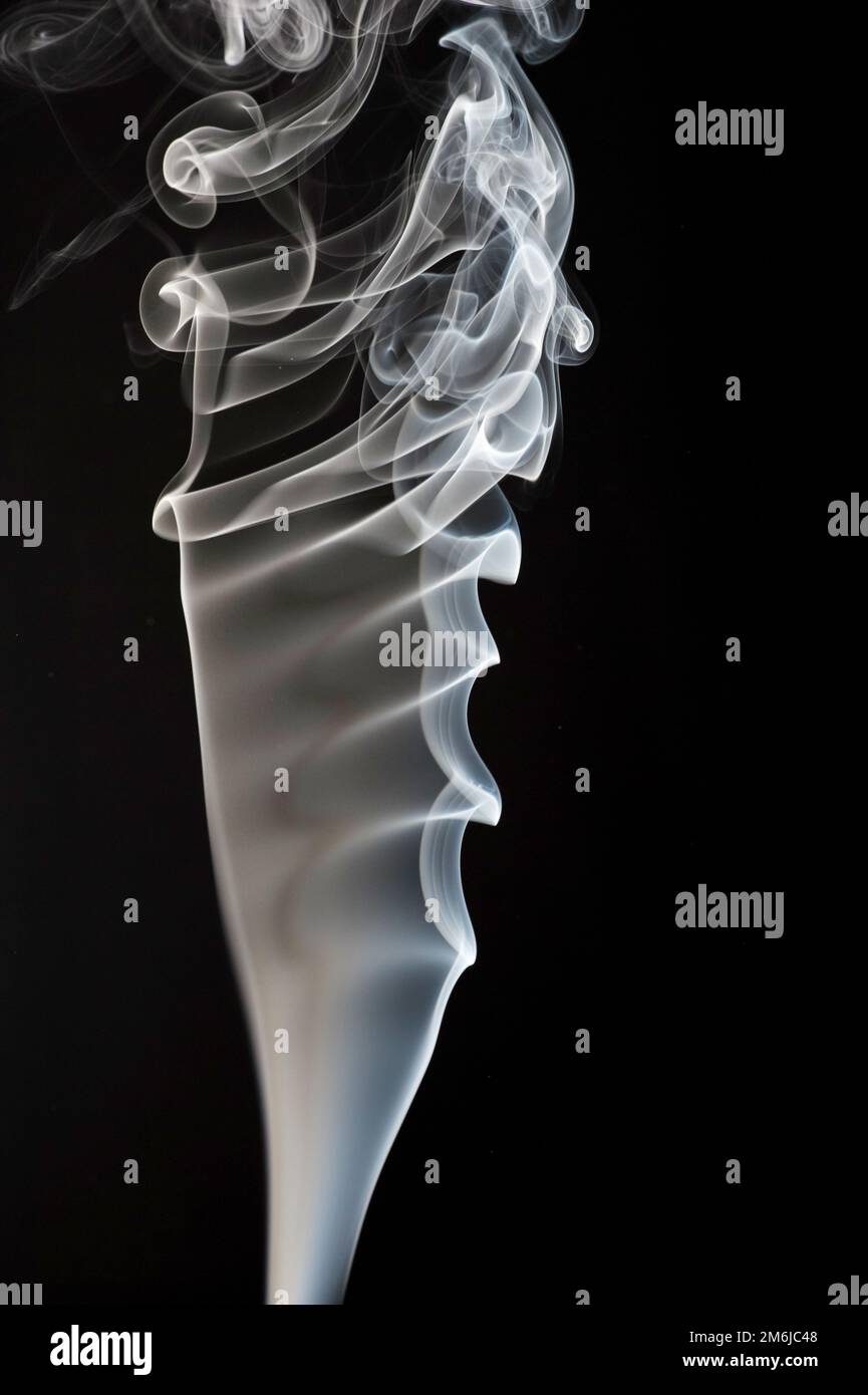 White smoke on black background Stock Photo - Alamy