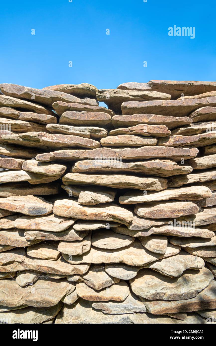 Natural paving stones stack decorative bricks blue sky Stock Photo