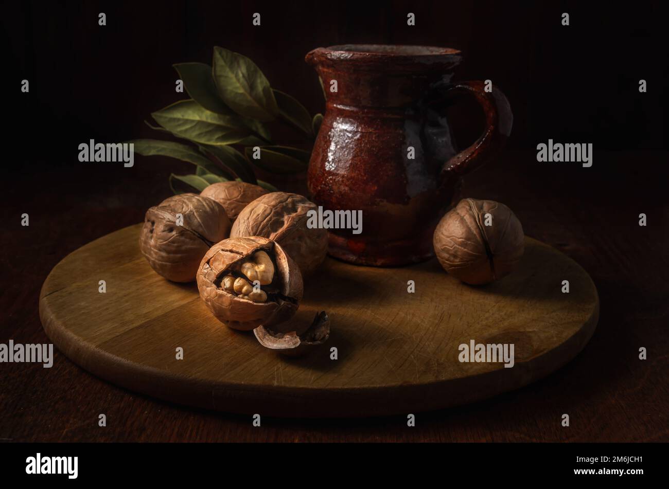 Walnuts on a dark background in a rustic style Stock Photo