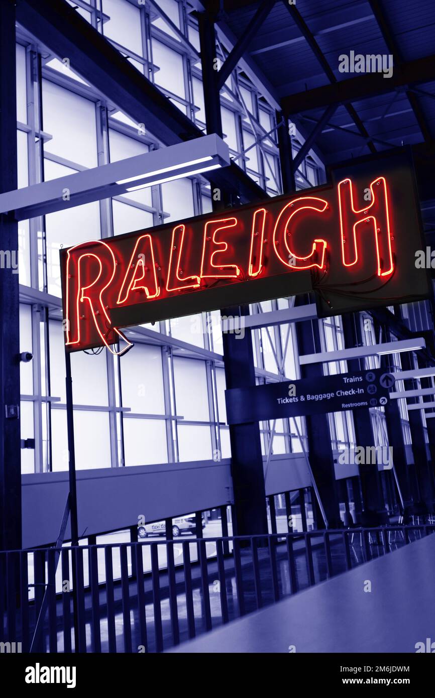 The interior of Union Station train depot in Raleigh, NC, with a neon