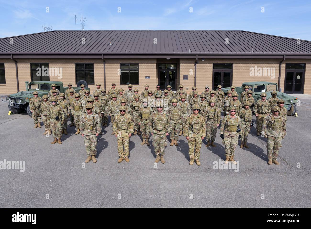U.S. Airmen with the 156th Contingency Response Group pause for a group